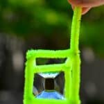 square cube soap bubble made with green pipe cleaners