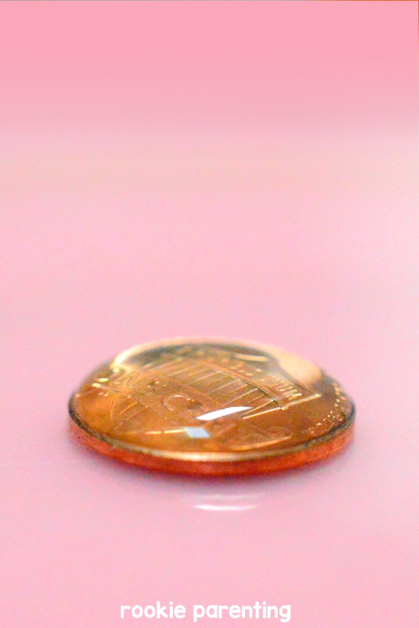What is surface tension? See how many drops of water you can put on a coin.